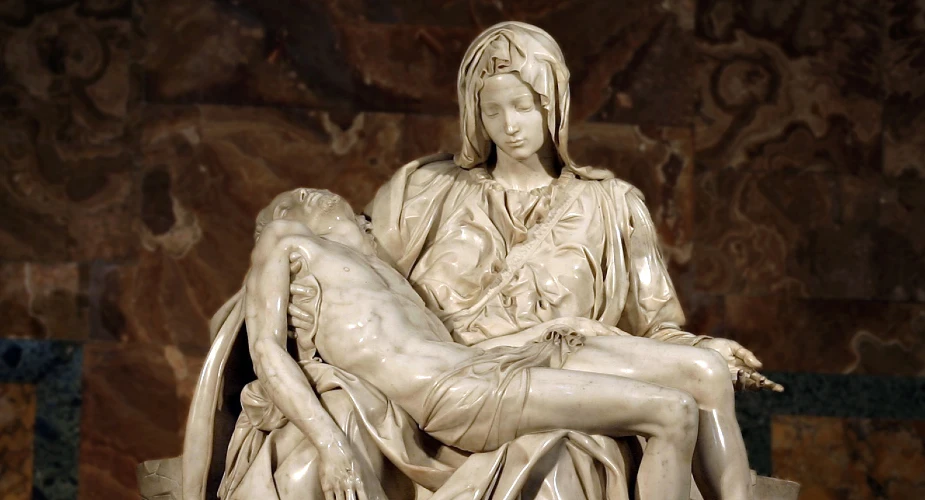 sculpture shows Mother Mary cradling the lifeless body of Jesus. sculpture shows Mother Mary cradling the lifeless body of Jesus.